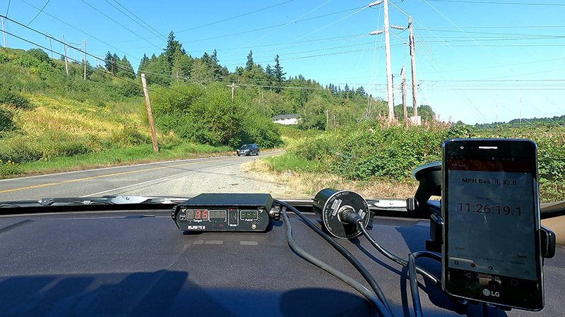 Radar Gun on red barn course